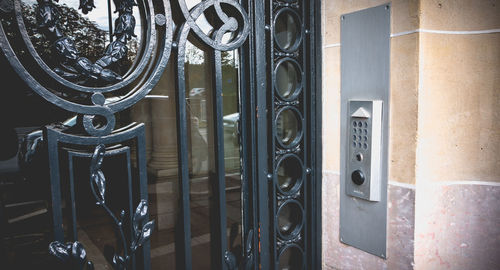 Close-up of metal door of building