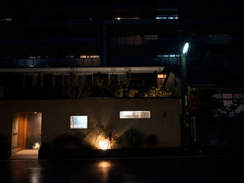 Illuminated buildings in city at night