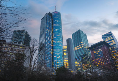 Modern buildings in city against sky