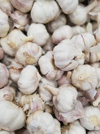 Full frame shot of onions for sale at market