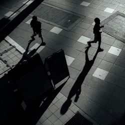 Shadow of woman on wall