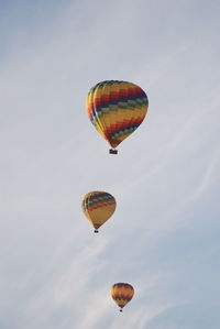 Low angle view of hot air balloons