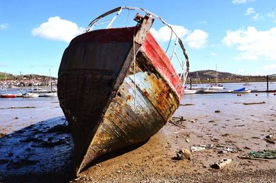 Boats moored at harbor