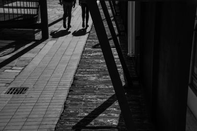 Low section of people on sidewalk in city