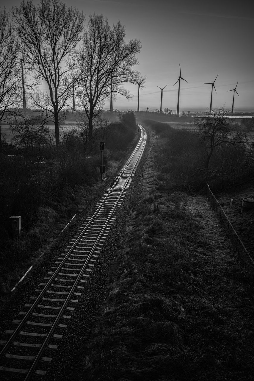 VIEW OF RAILROAD TRACK AGAINST SKY