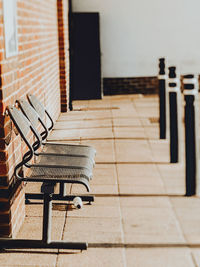 Empty chairs outside of building