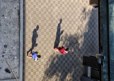 High angle view of people on floor