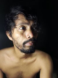 Portrait of shirtless man