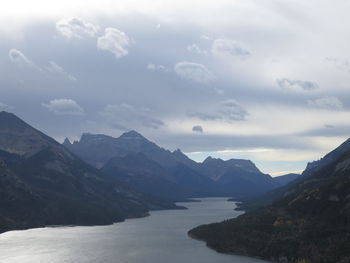 Scenic view of mountains and sea against sky