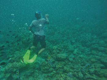 Man swimming in sea