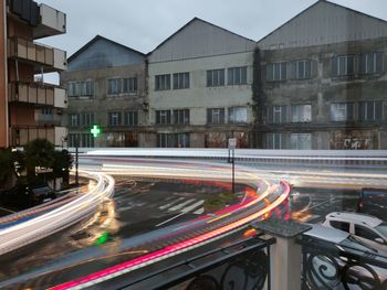 High angle view of light trails on road in city