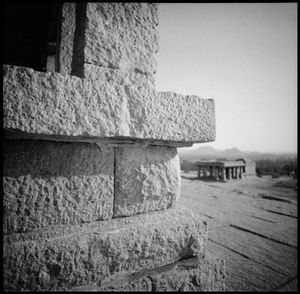 Close-up of stone wall against clear sky