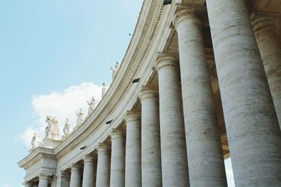 Low angle view of bernini colonnade against sky