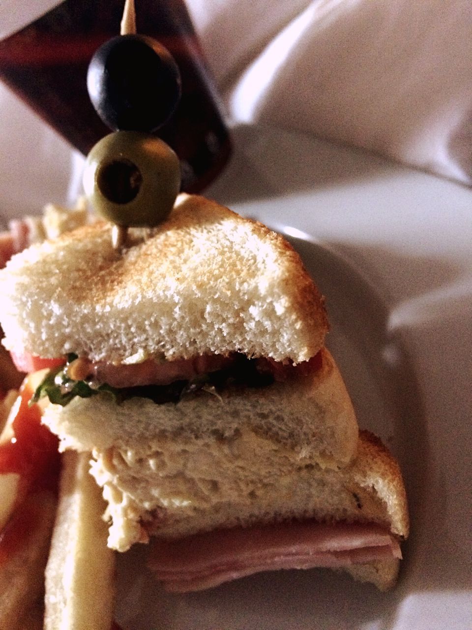 CLOSE-UP OF BREAD ON CAKE