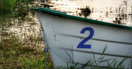 Boat with number 2 moored at lakeshore