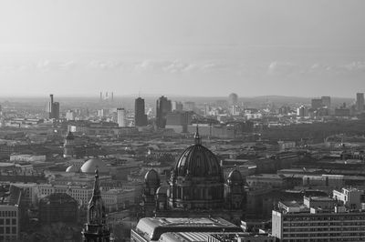 High angle view of city buildings against sky