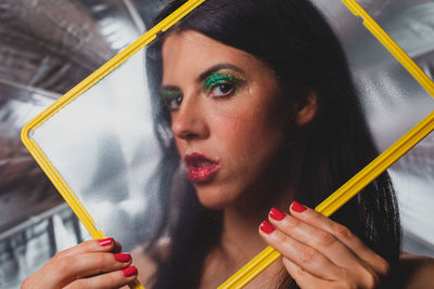 Close-up portrait of a woman looking away