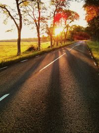 Empty road at sunset