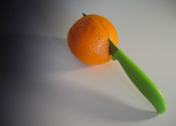 Close-up of orange fruit on table