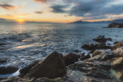 Scenic view of sea against sky during sunset