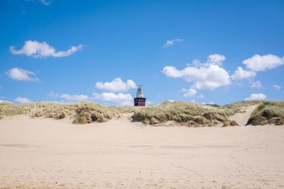 Scenic view of beach against sky