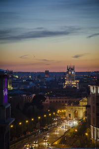 High angle view of illuminated cityscape at night