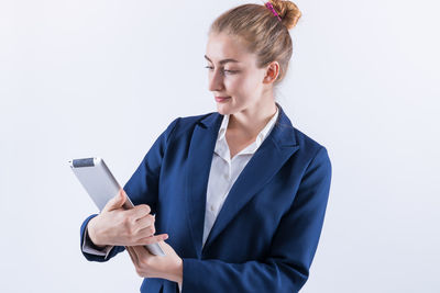 Young woman using mobile phone