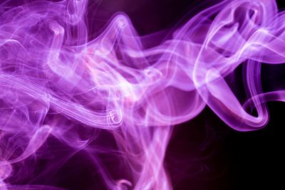 Close-up of smoke against black background