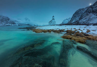 Scenic view of sea against sky during winter