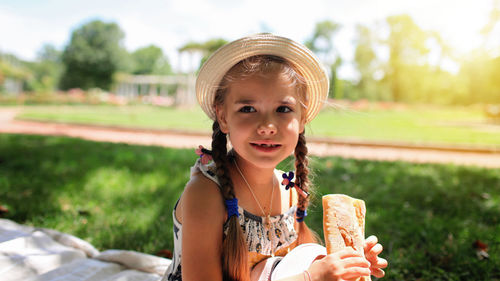 Portrait of girl holding ice cream
