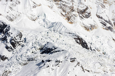 The beauty of the snow white cliffs on the mountainside.