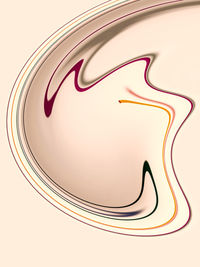 Close-up of metal object over white background