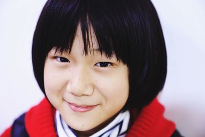 Close-up portrait of smiling girl