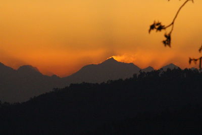 Scenic view of mountains at sunset