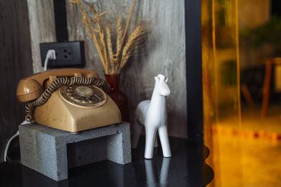 Close-up of mannequin on table at home