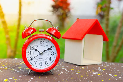 Close-up of clock on table