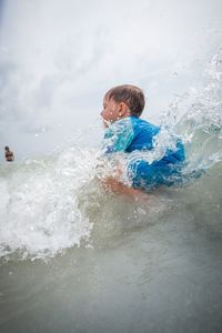 Man surfing in sea