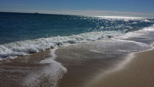 Waves splashing on shore