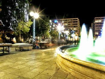 Illuminated street light at night