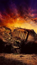 Scenic view of field against sky during sunset