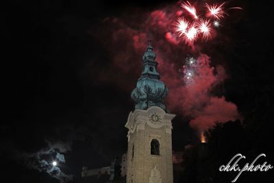 Low angle view of firework display at night