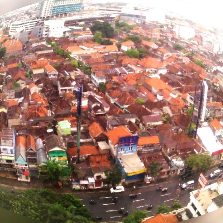 building exterior, architecture, built structure, city, residential building, residential structure, residential district, house, building, high angle view, cityscape, street, day, crowded, outdoors, roof, window, city life, no people, tower