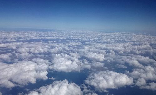 Scenic view of landscape against cloudy sky