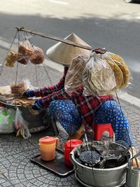 High angle view of woman standing at beach