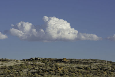 Low angle view of landscape against sky