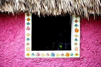 Close-up of multi colored window on wall