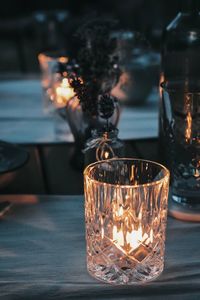 Close-up of tea light candles on table