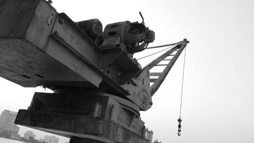 Low angle view of construction site against clear sky