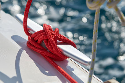 Close-up of rope tied to bollard