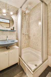 Low angle view of shower head in bathroom